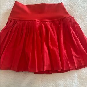 Red Alo pleated skirt. Gently worn. Perfect for tennis or just to wear